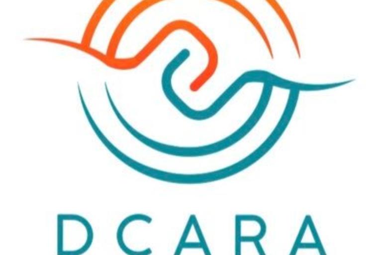 DCARA's logo, two lines hooked together surrounding by a double bordered circle.