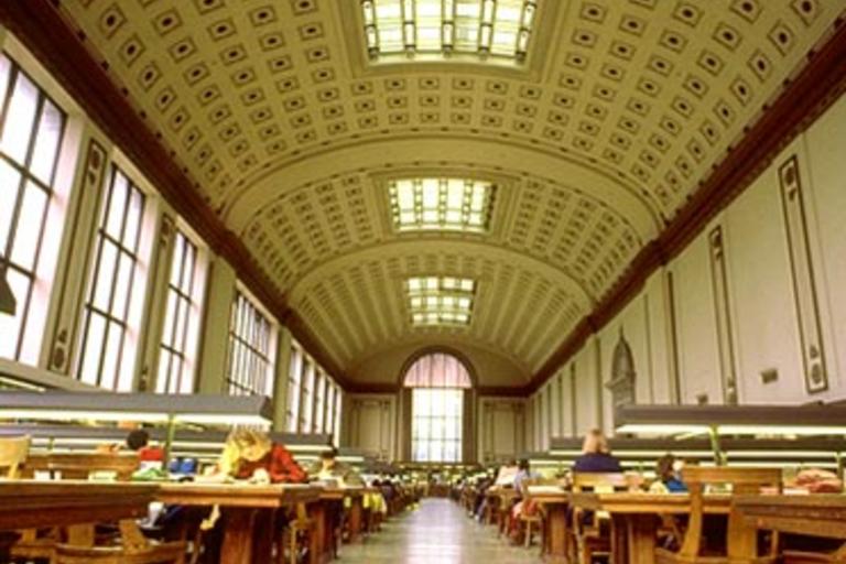 A zoomed out image of the reading room within Doe Library, with views of the grid-like ceiling pattern.
