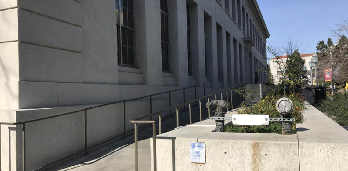 The accessible entrance to the Bancroft Library, facing north. The access path is a ramp starting to the left.