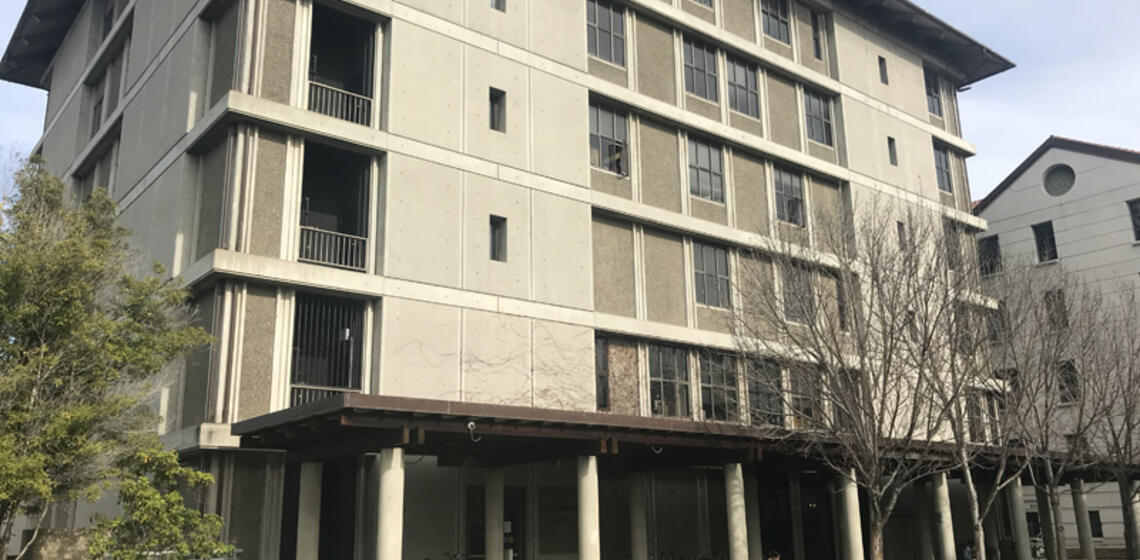 The front side of Barker Hall, facing south. The access path is located on either side of the building.