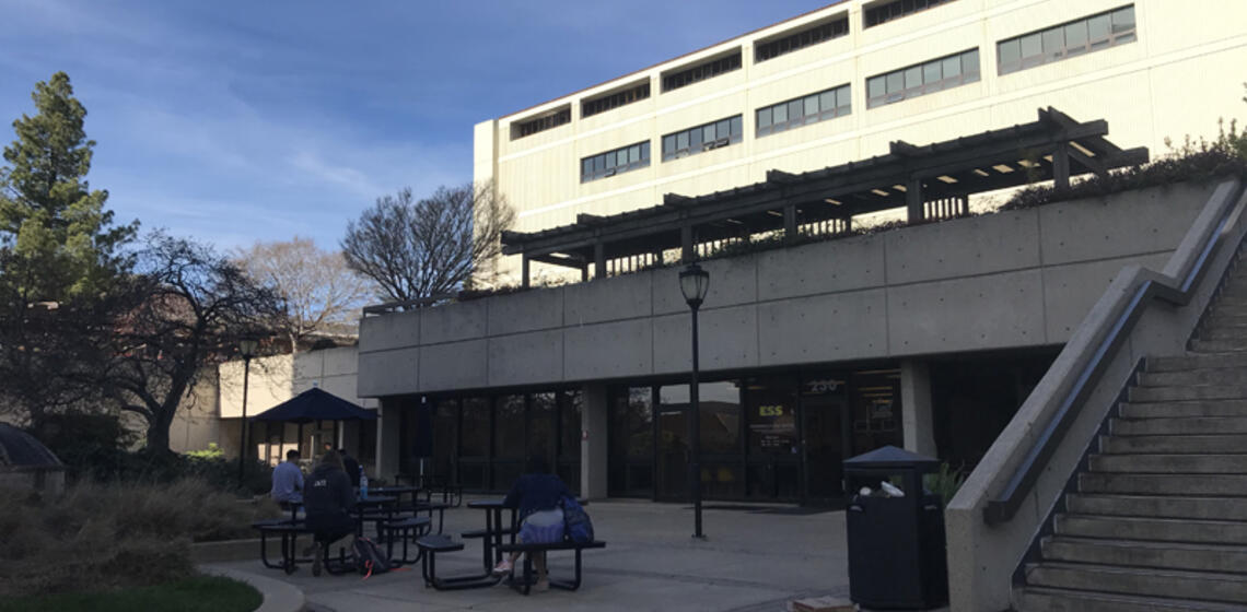 The south side of Betchel. To the right of the entrance is a staircase leading to the roof of the building.