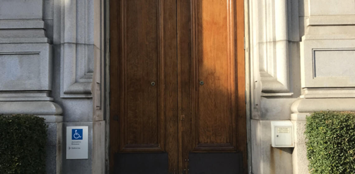 The south side accessible entrance to California Hall. An intercom to the right of the entrance is used to open the door.