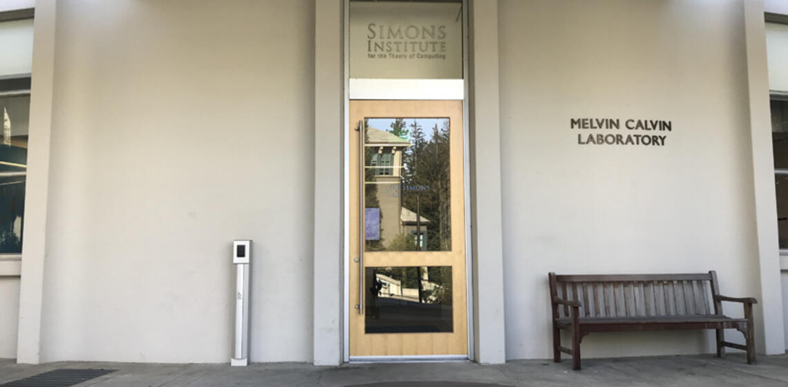The main entrance to Calvin Laboratory, facing north. To the left of the entrance is an automatic door opener.