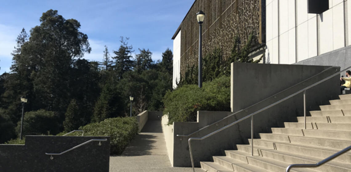 The access path to the lower entrance of the East Asian Library. It is a ramp south of the building.