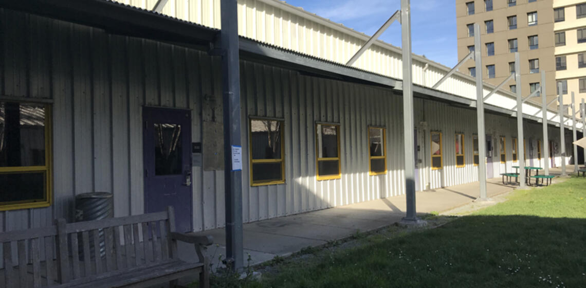 A photo of Building D of Hearst Field Annex. There are multiple ground level entrances.