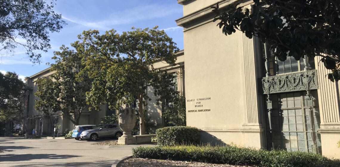 The frontside of Hearst Gym, facing east. The access path is on either side of the front entrance, which is on the right side.