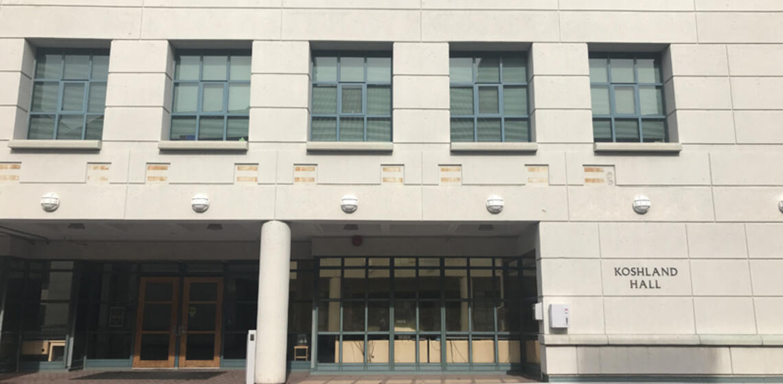 The front side of Koshland Hall, facing South. The front entrance is on the left side of the building, and is at ground level.