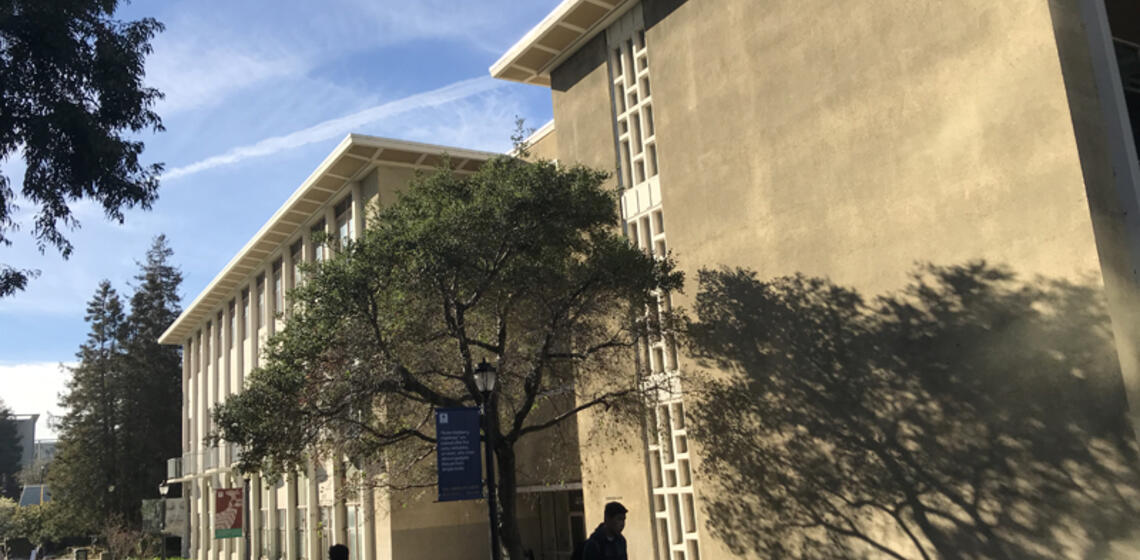 The front side of Anthropology & , facing east. The front entrance is at ground level, and is on the right side of the building.