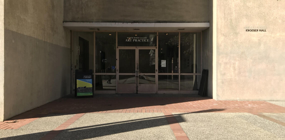 The main entrance to Anthropology & Art Practice facing east. The manual, double doors are located at ground level.