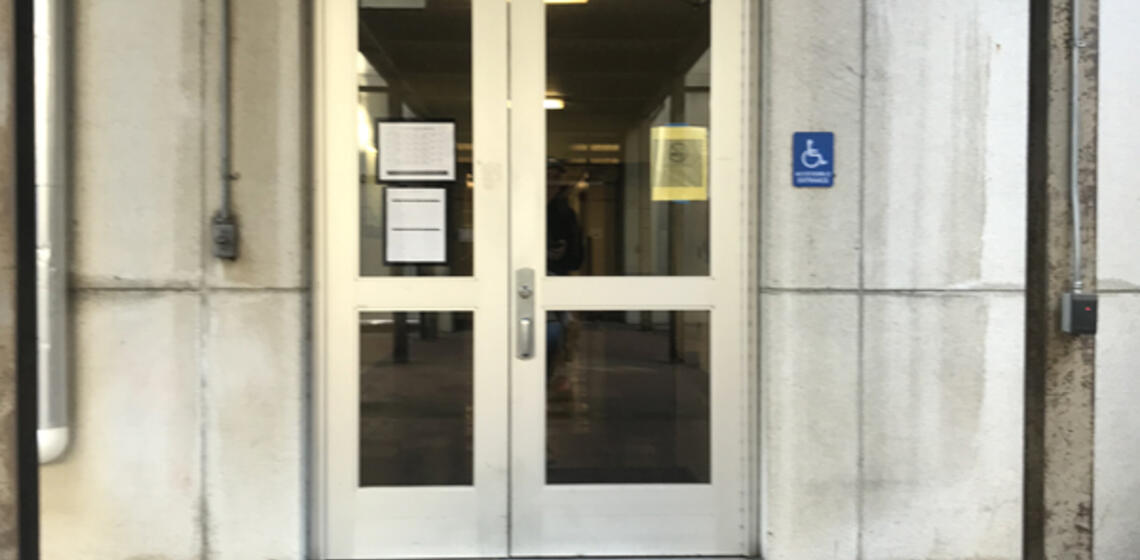 The accessible entrance to Physics, located on the building's south side.