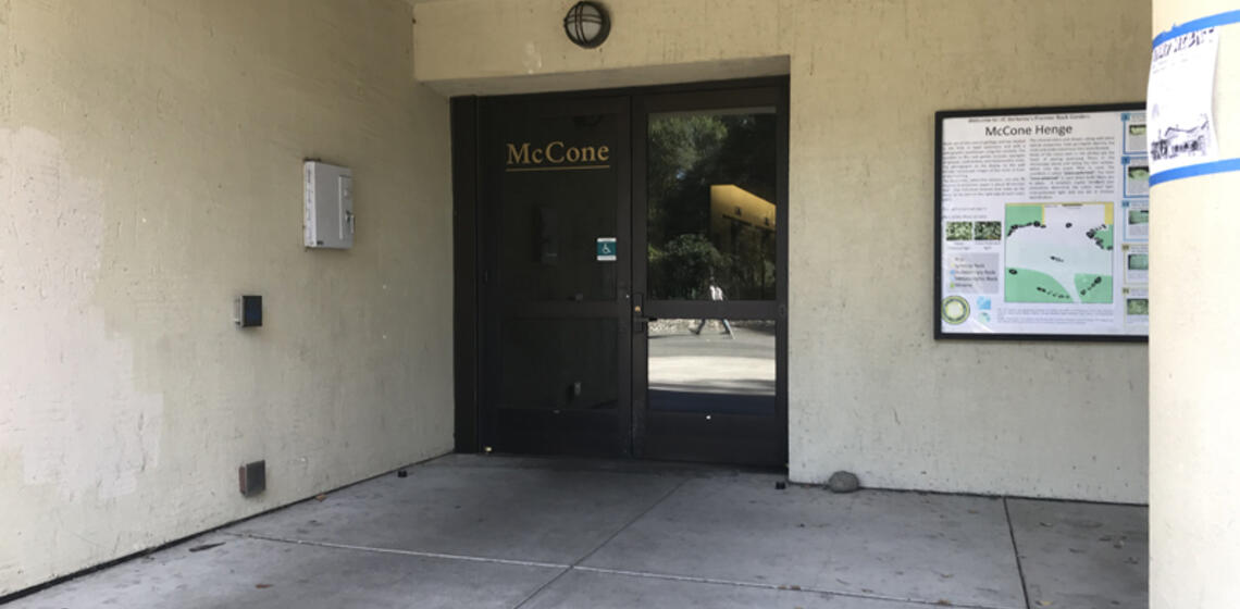The westside accessible entrance to McCone Hall. To the left of the entrance is an automatic door opener.