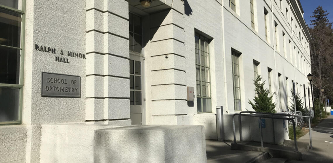 The front side of Minor Hall, facing east. The accessible ramp is located to the right of the main entrance's stairs.