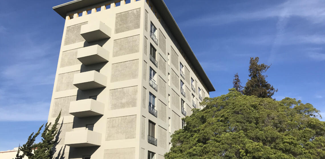 The south side of Simon Hall. The accessible path is a small walkway on the north side of Bancroft Way.