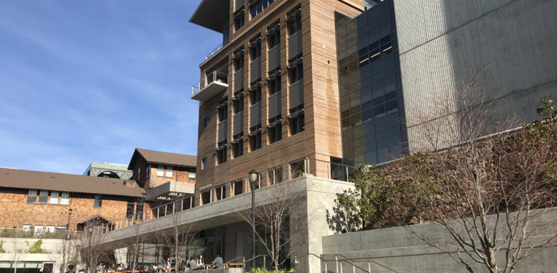 The front side of Sutardja Dai Hall, facing west. The accessible path is a ramp to the right of the front entrance's stairs.
