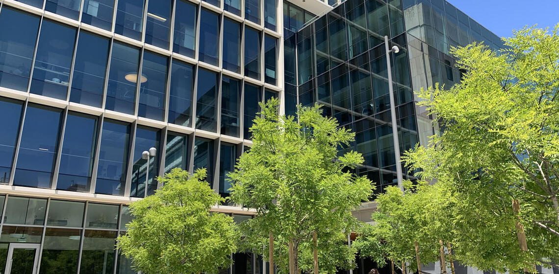 The southeast face of Berkeley Way West. There is a small plaza and a short path to the Southeast entrance.
