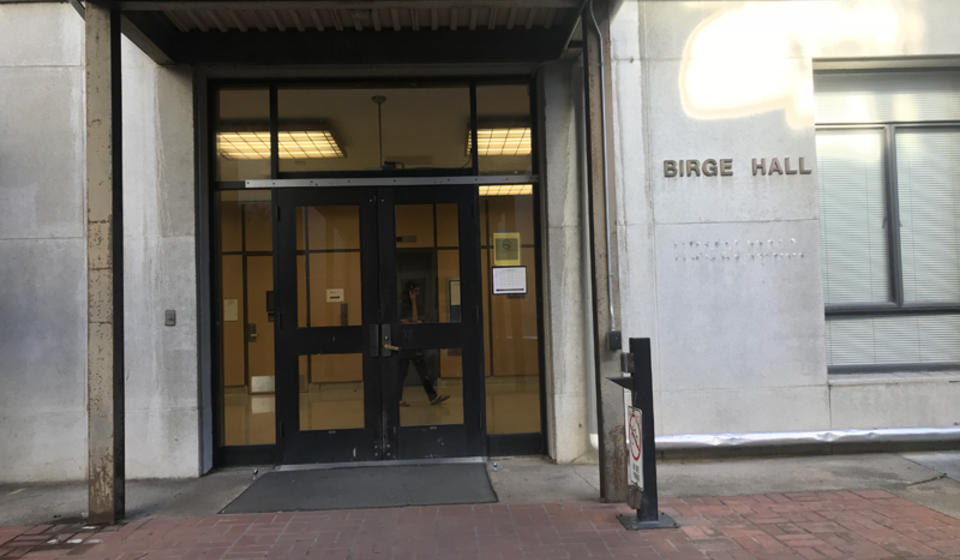 The accessible entrance to Birge Hall, facing northside. There is an automatic door opener to the right of the entrance.
