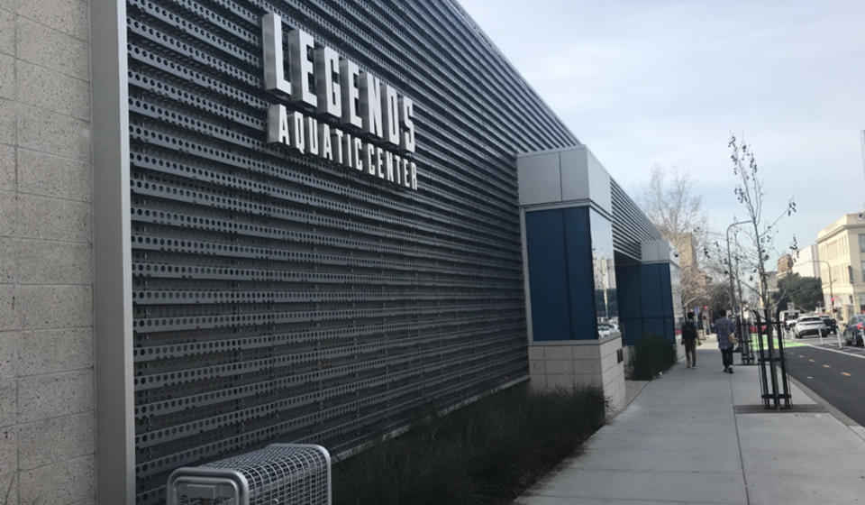 The front side of Legends Aquatic Center, facing north. The access path is a ramp to the right of the entrance's front stairs.
