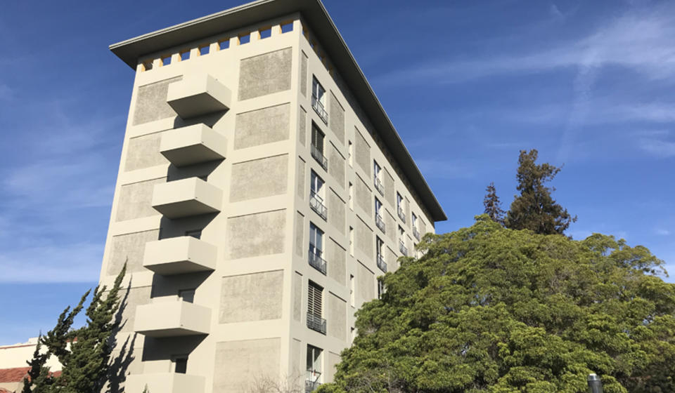 The south side of Simon Hall. The accessible path is a small walkway on the north side of Bancroft Way.