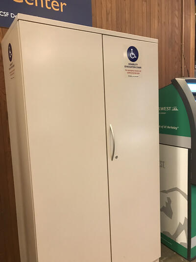 The evacuation chair for Moffitt Library, located near the southside entrance. The chair is located in an evacuation cabinet. 